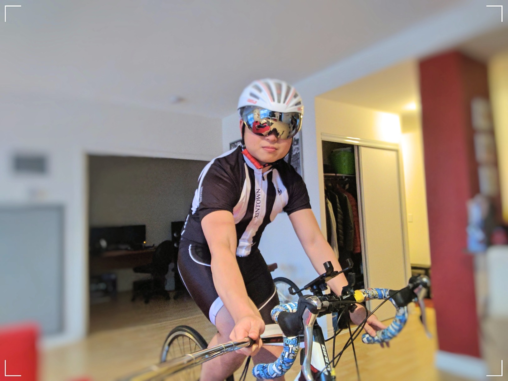 (It wasn’t sunny outside, hence I am inside… the helmet improves the airflow…)